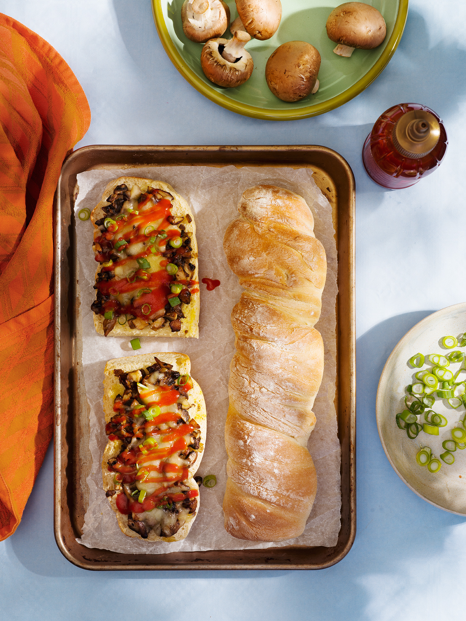 a tray of bread and sandwiches