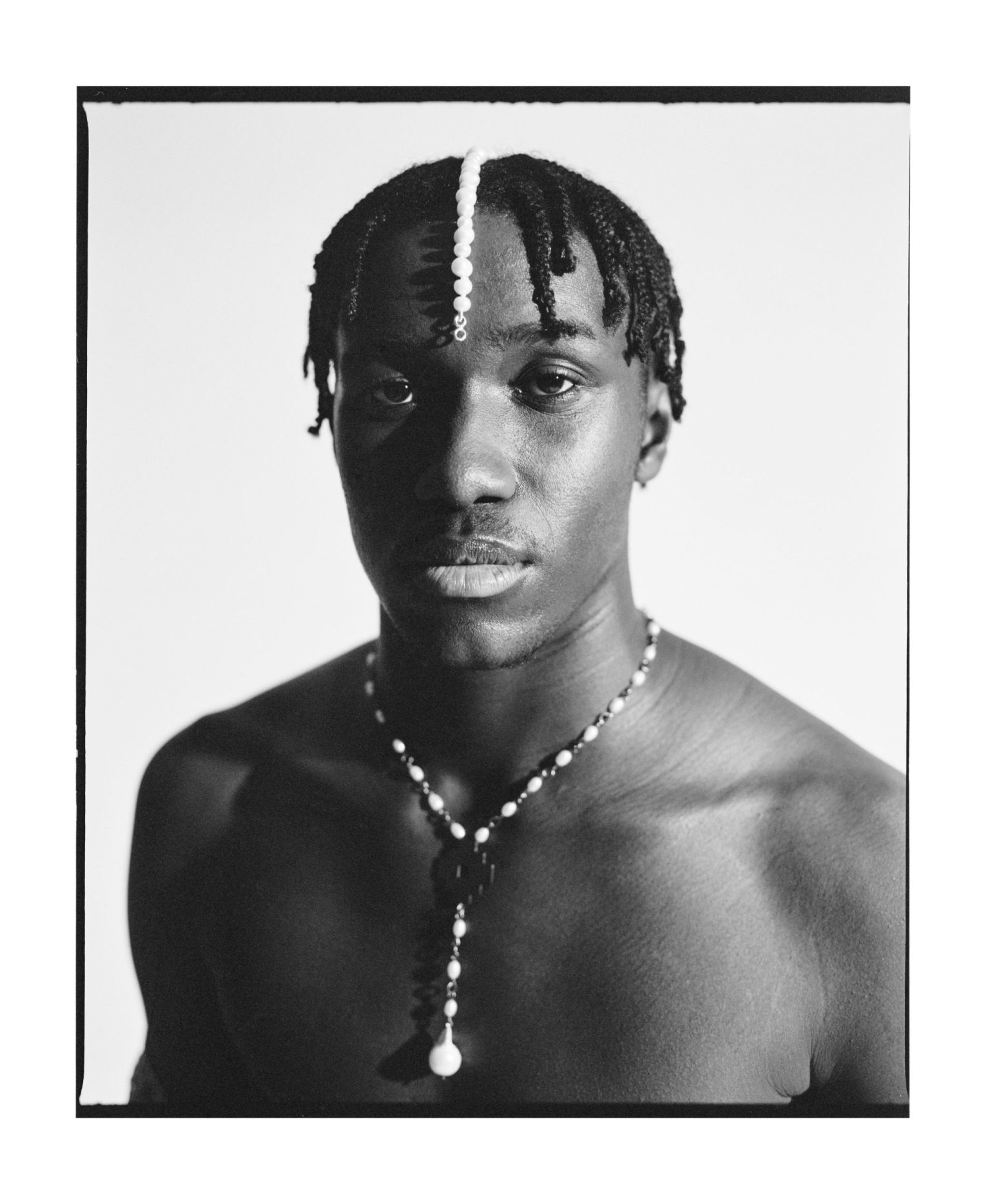 a man with a necklace