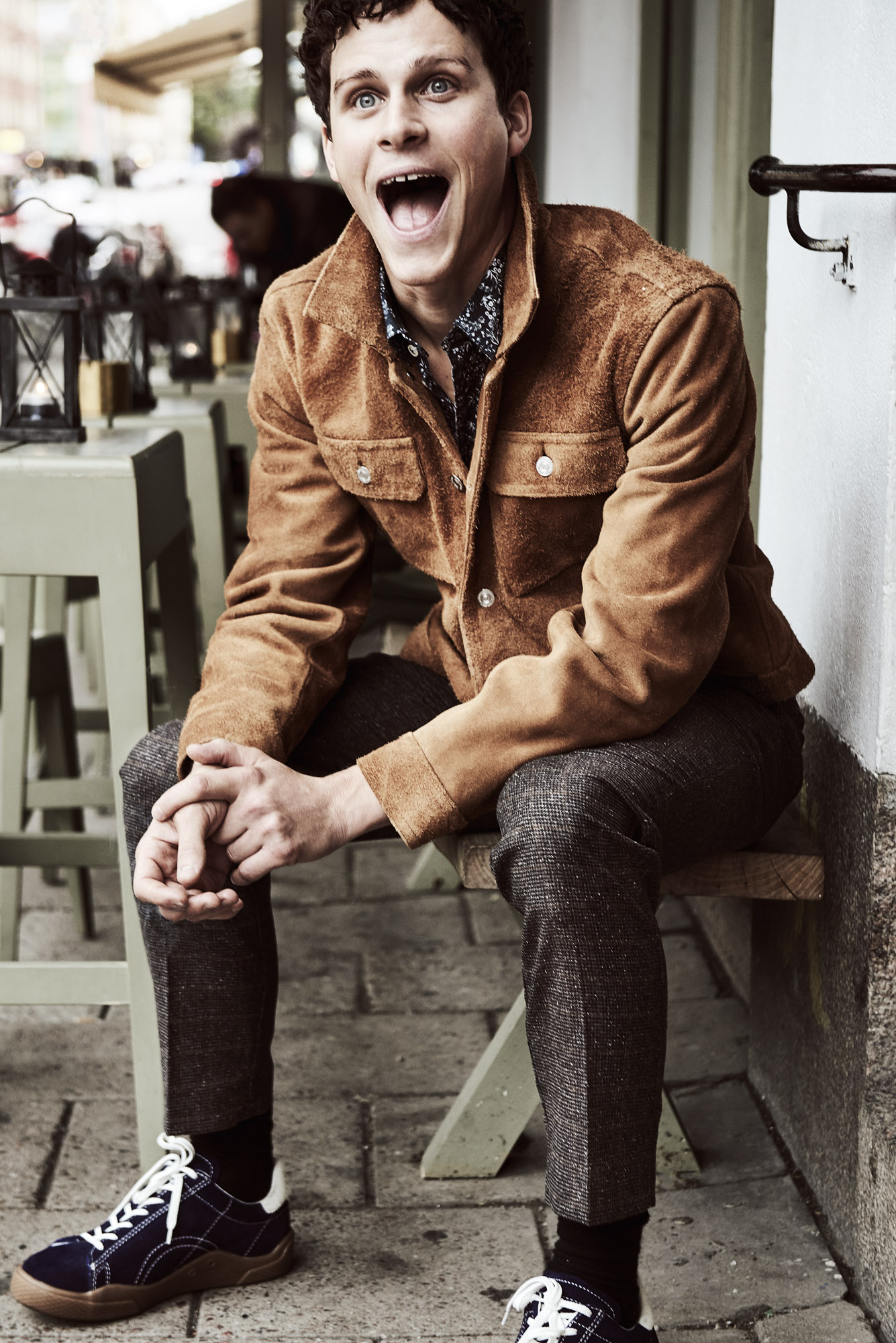 a man sitting on a bench