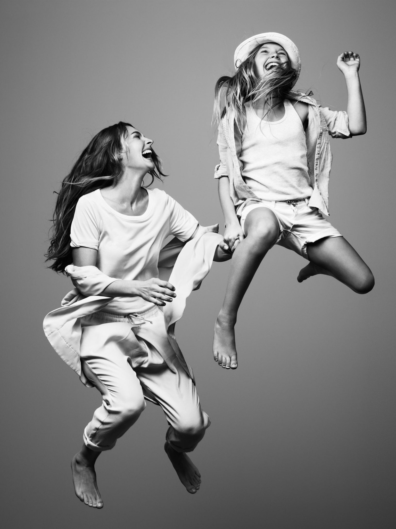 two women jumping in the air