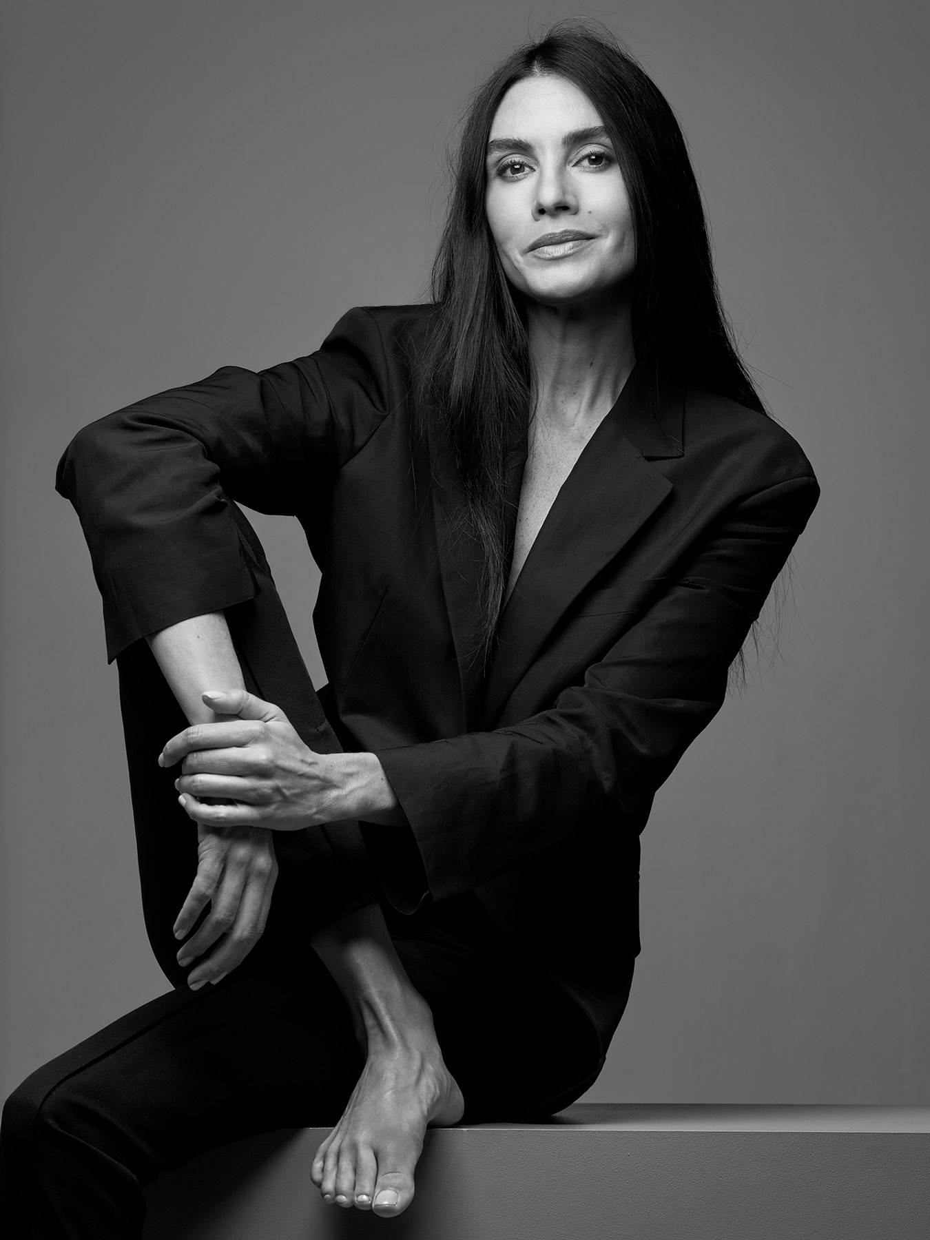 a woman in a suit