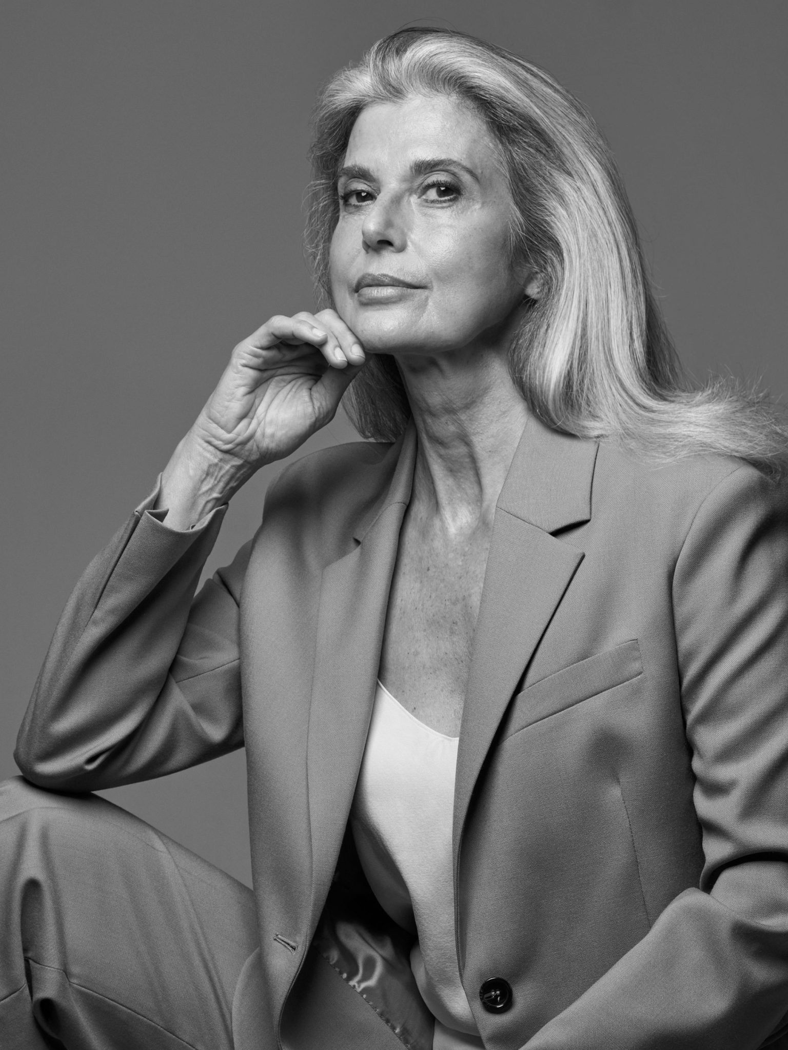a woman in a suit