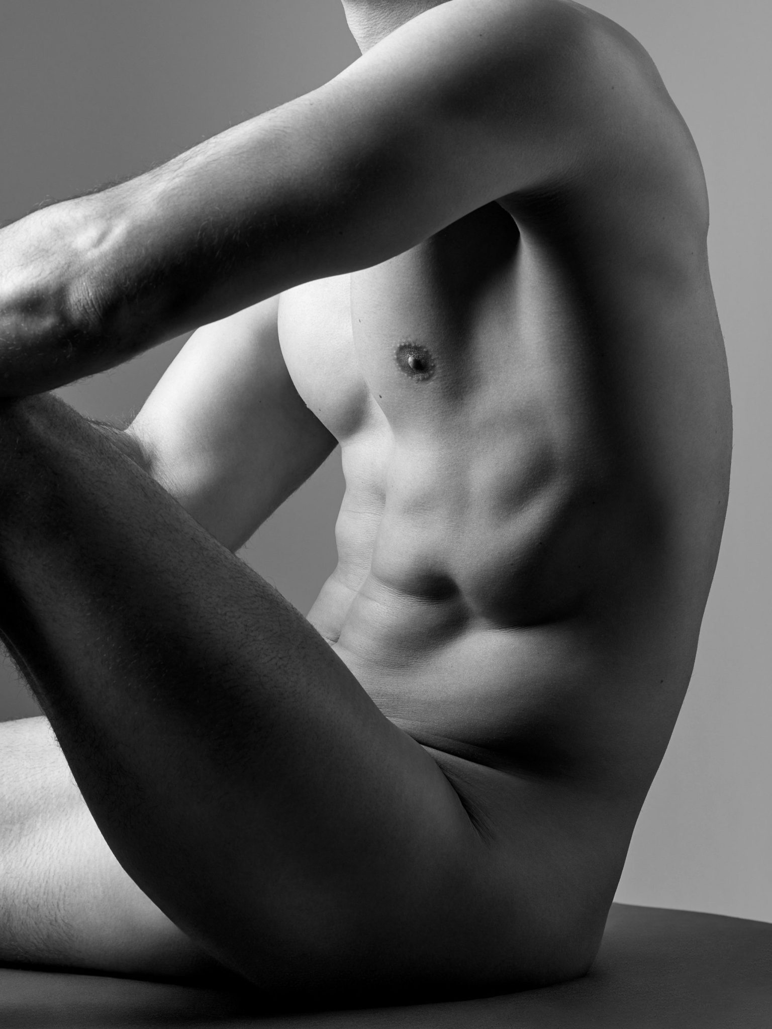 a man's torso and arms