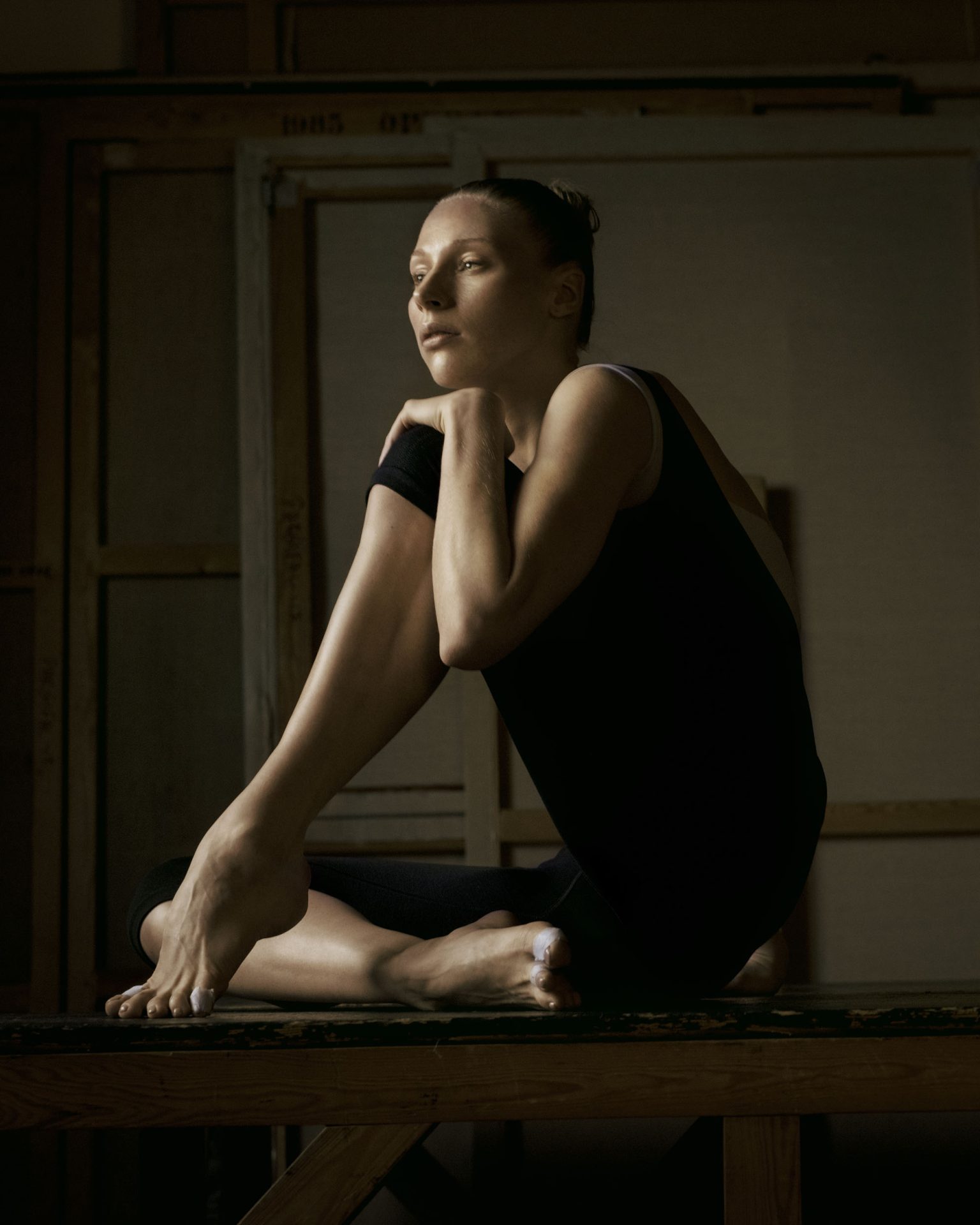 a woman sitting on a bench