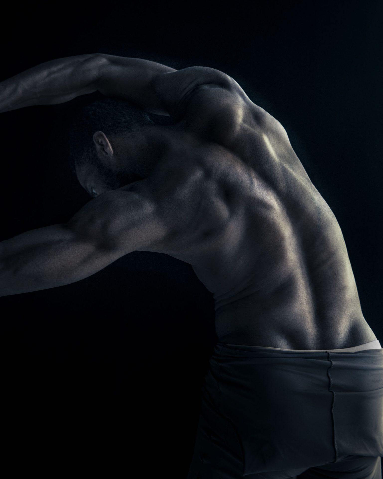 a man stretching his back