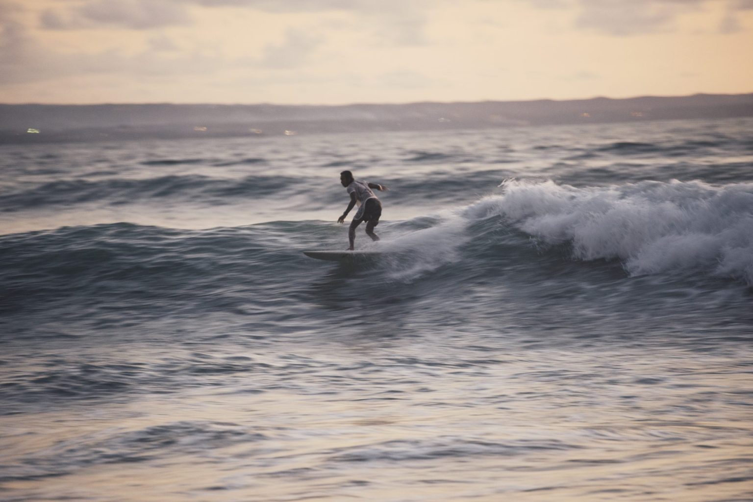a person on a surfboard in the ocean