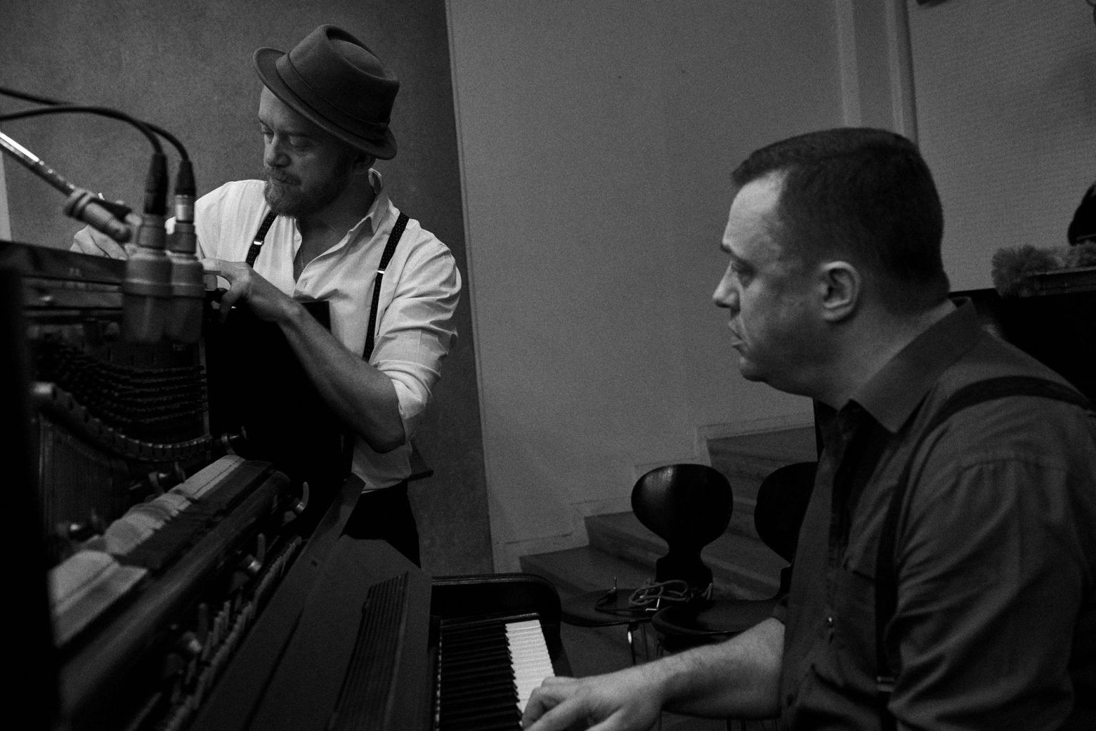 a man playing a piano