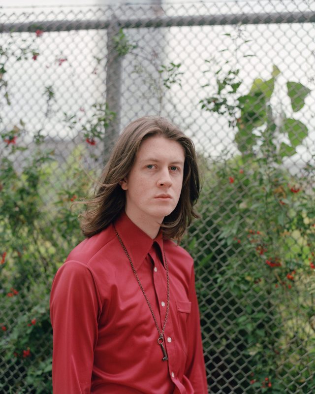 a man in a red shirt