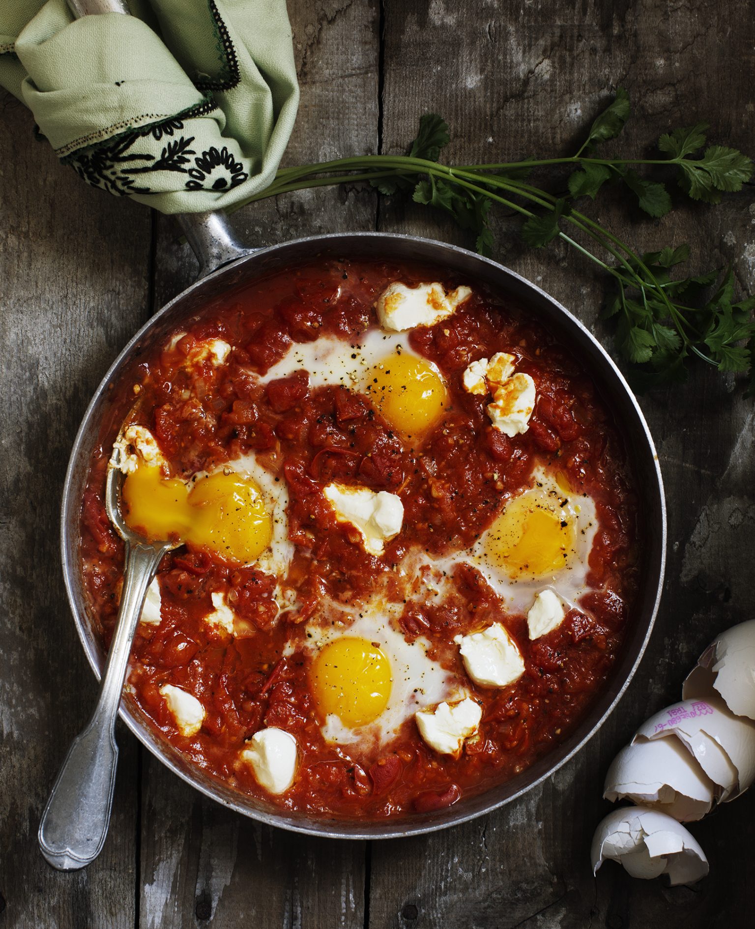 a pan of food with eggs and sauce