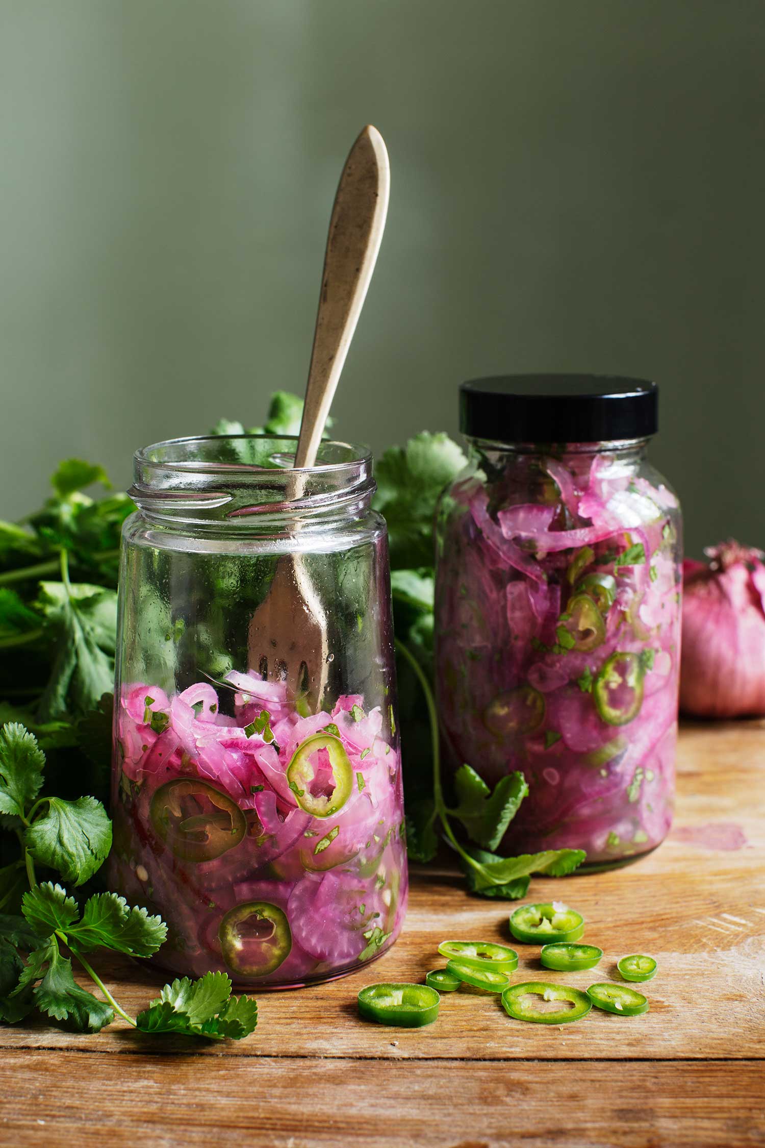 a jar of pickled onions and jalapenos