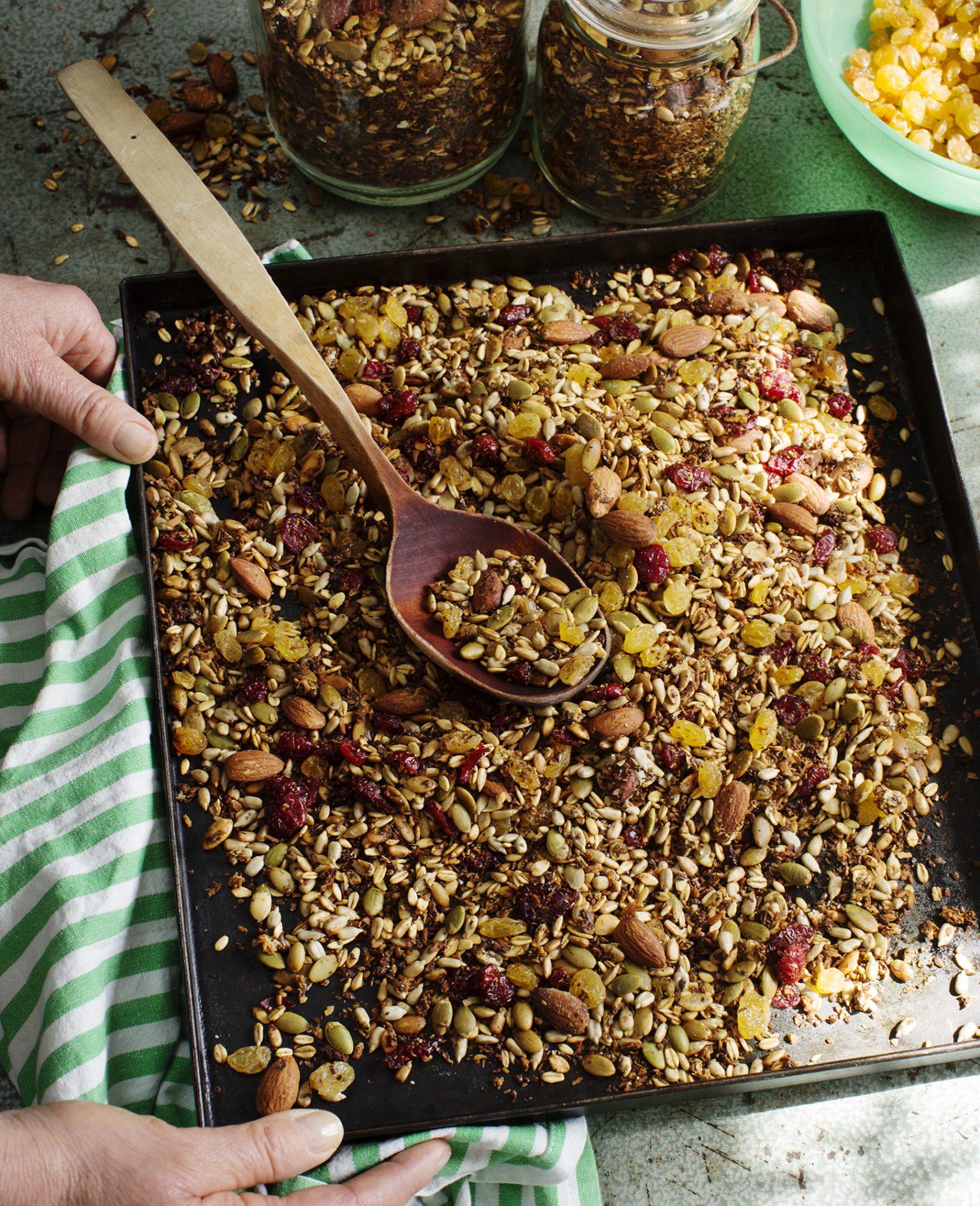 a spoon in a tray of food