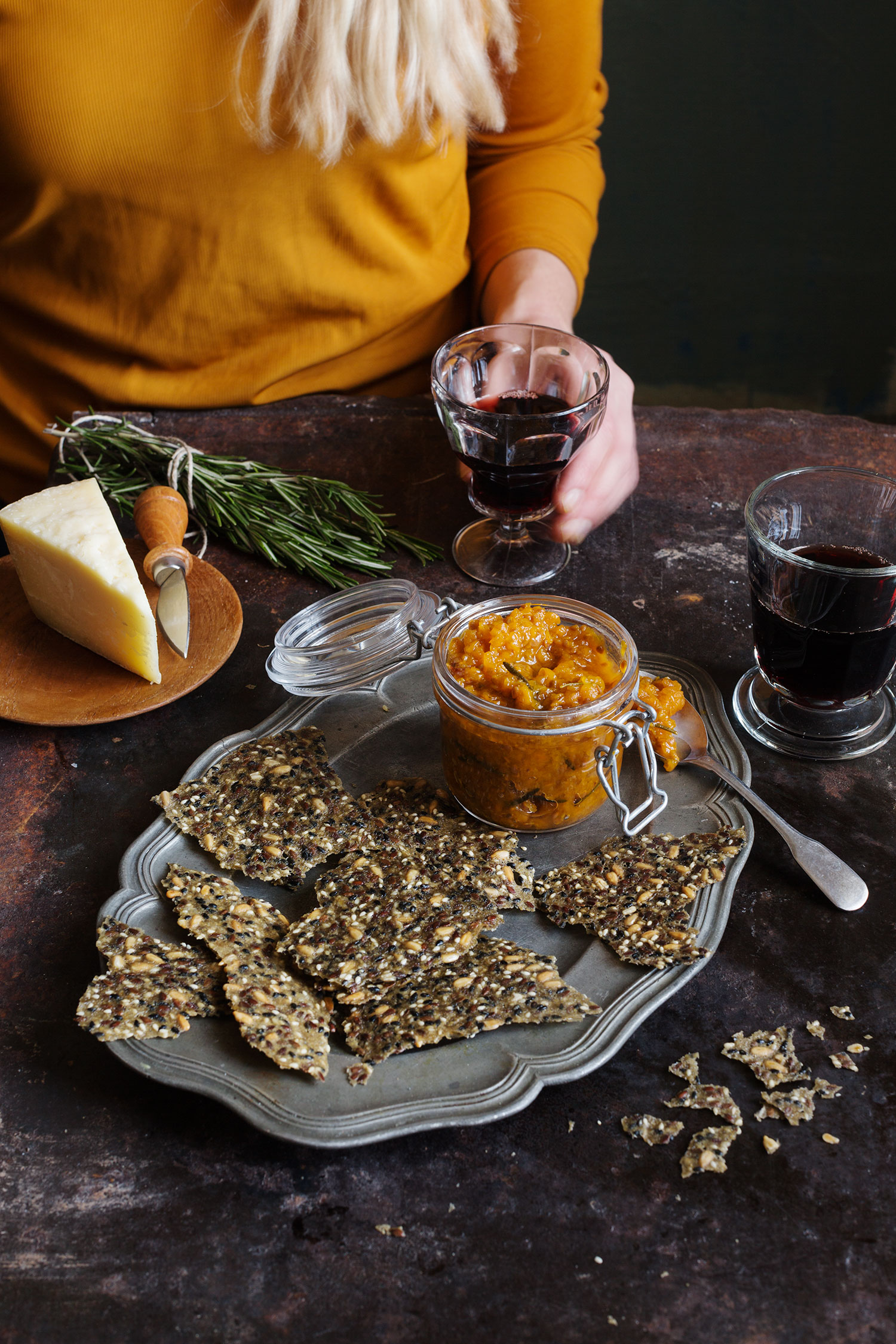 a plate of food and a glass of wine