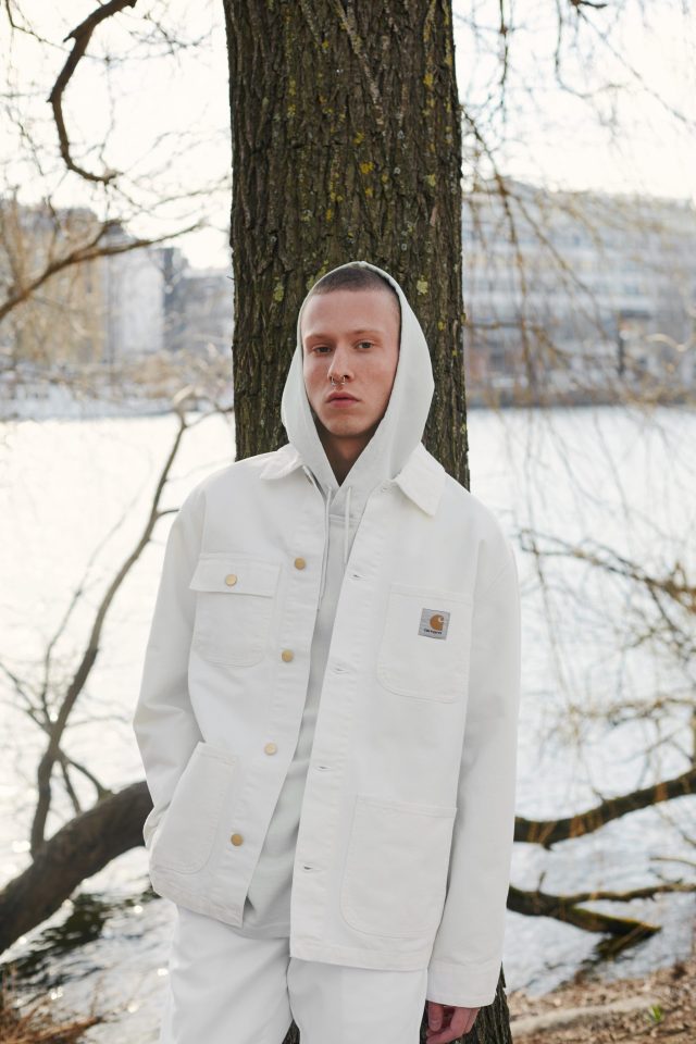 a man in a white jacket