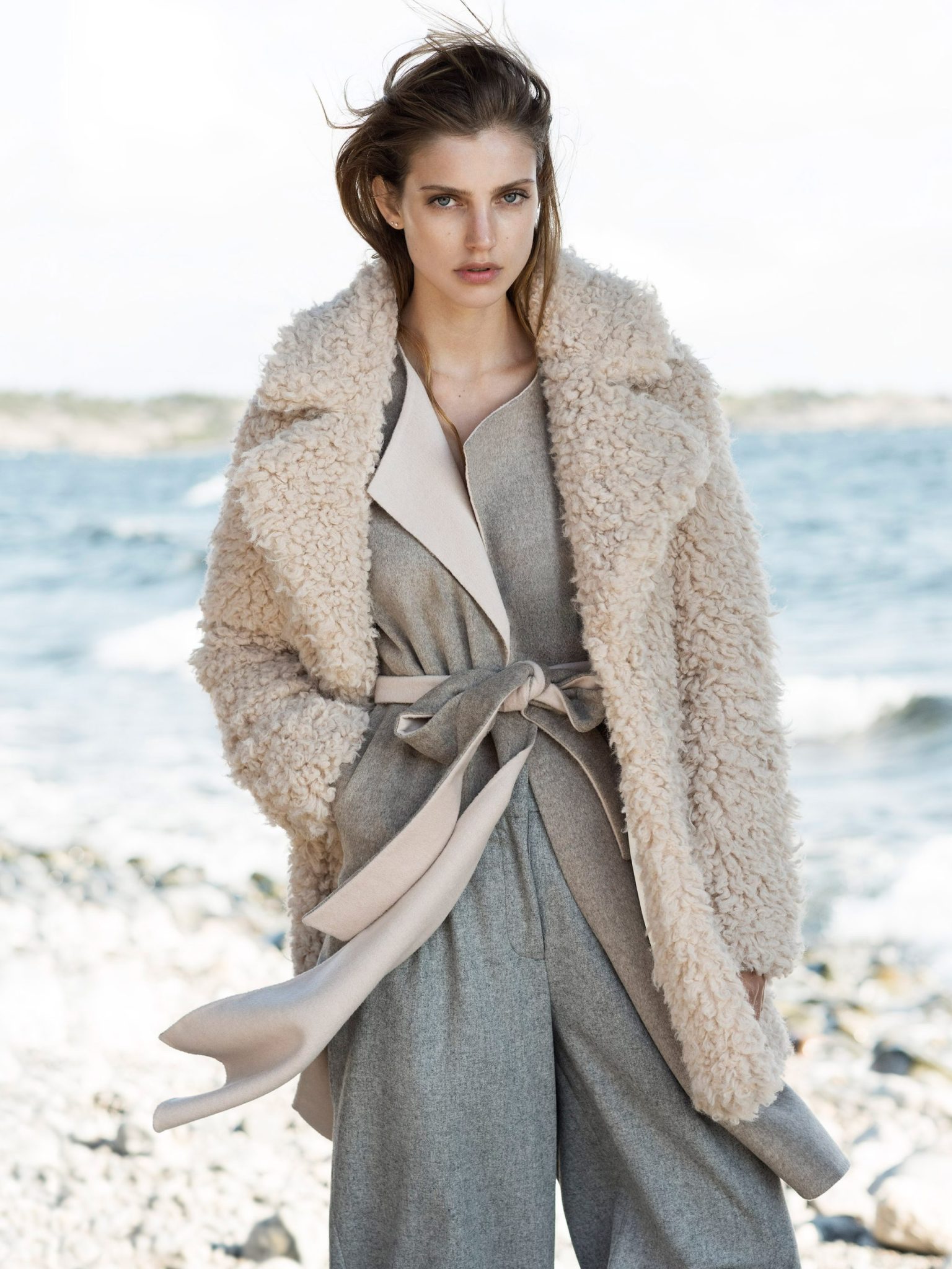 a woman in a coat
