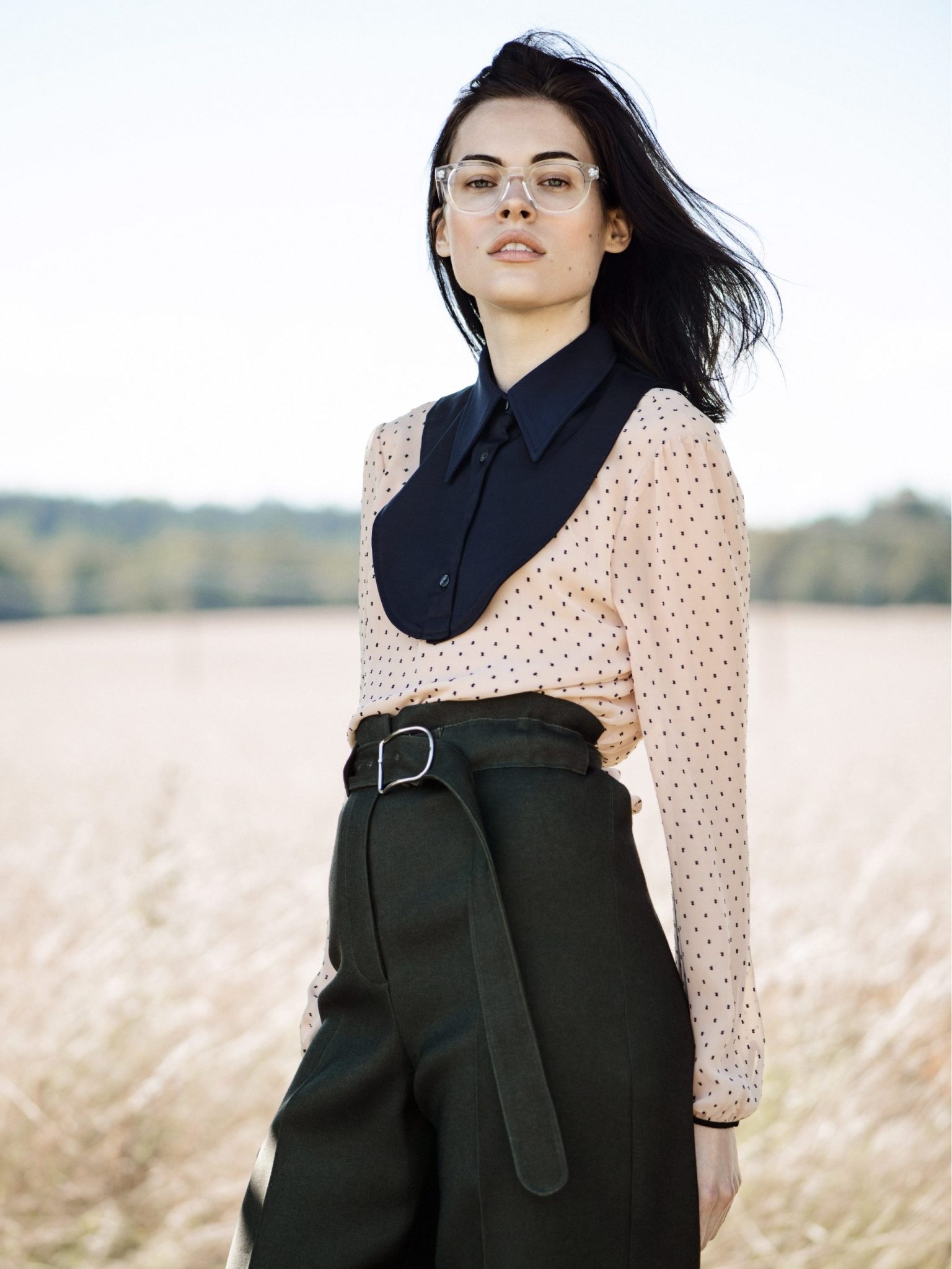a woman in a field