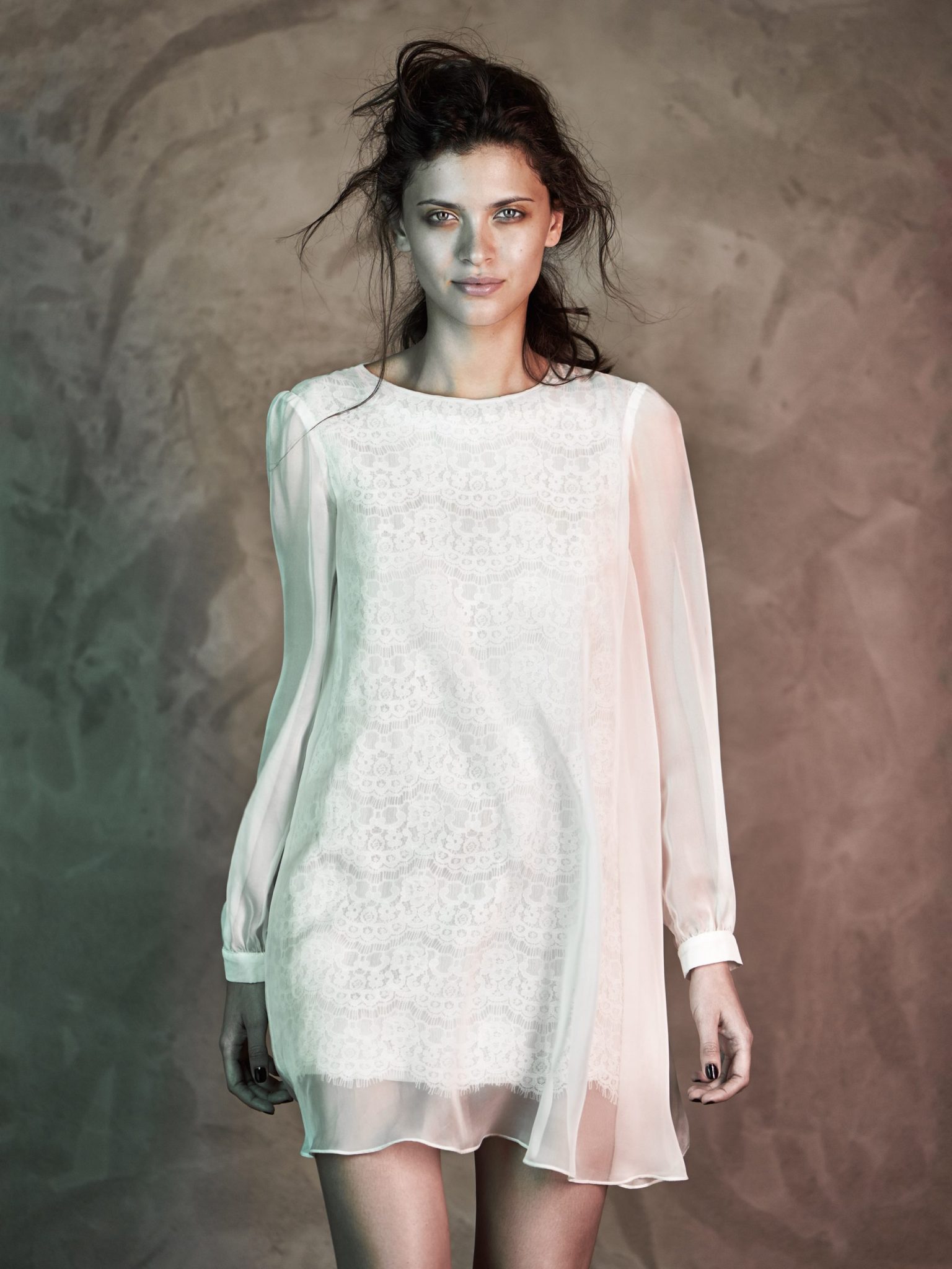 a woman in a white dress