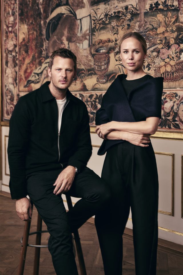 a man and woman posing for a picture
