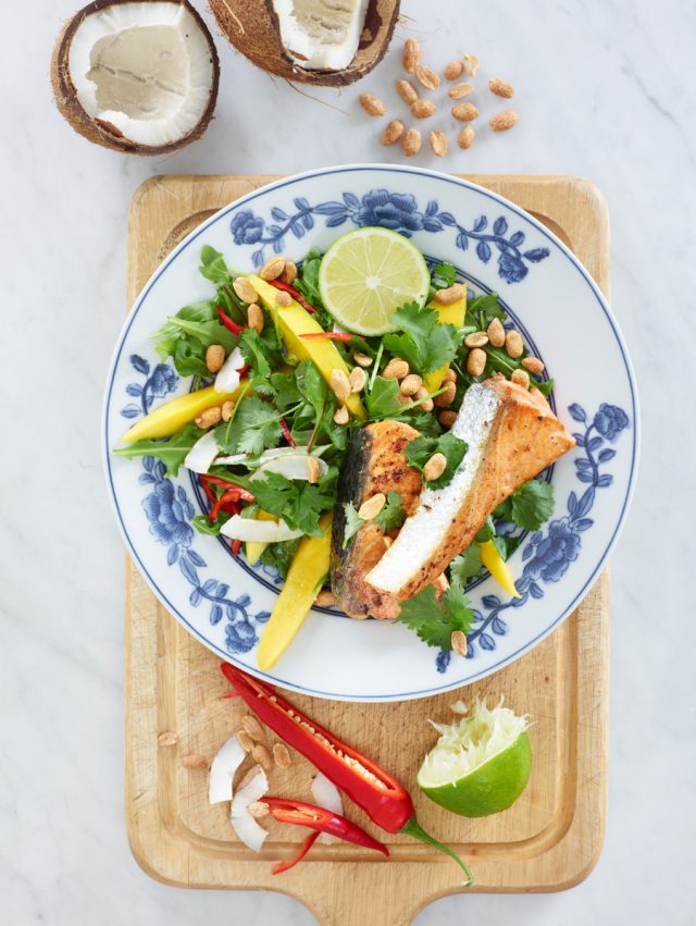 a plate of food on a cutting board