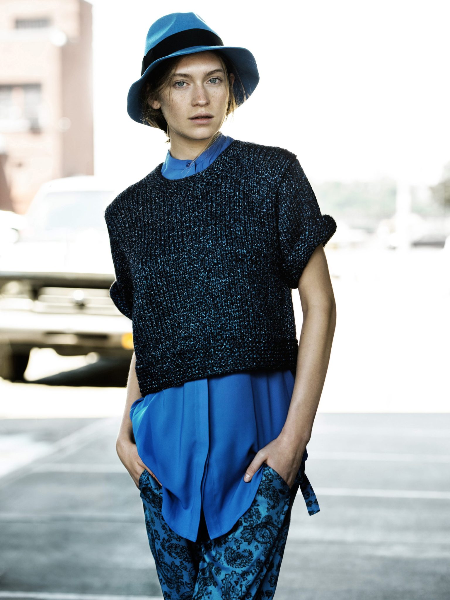 a woman in a blue hat