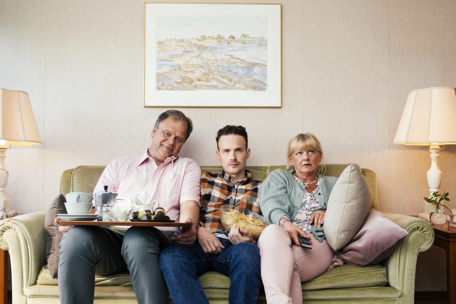 a group of people sitting on a couch