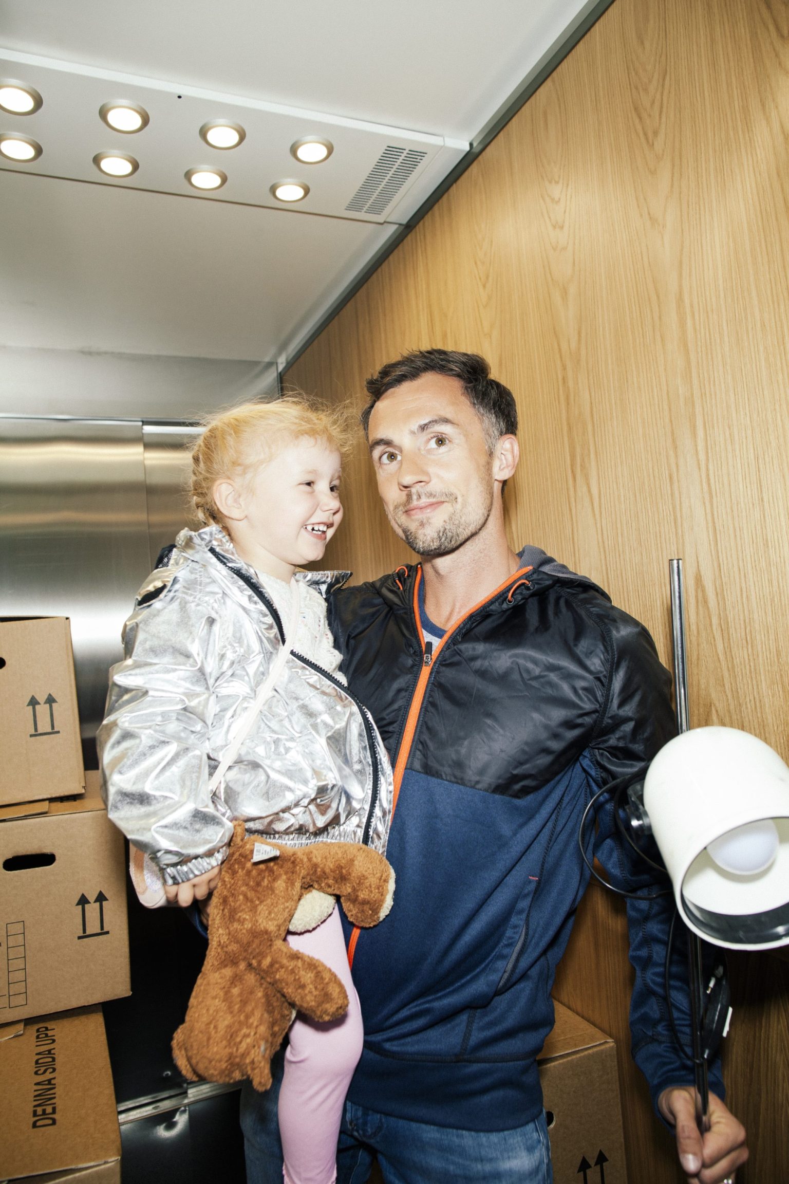 a man holding a child
