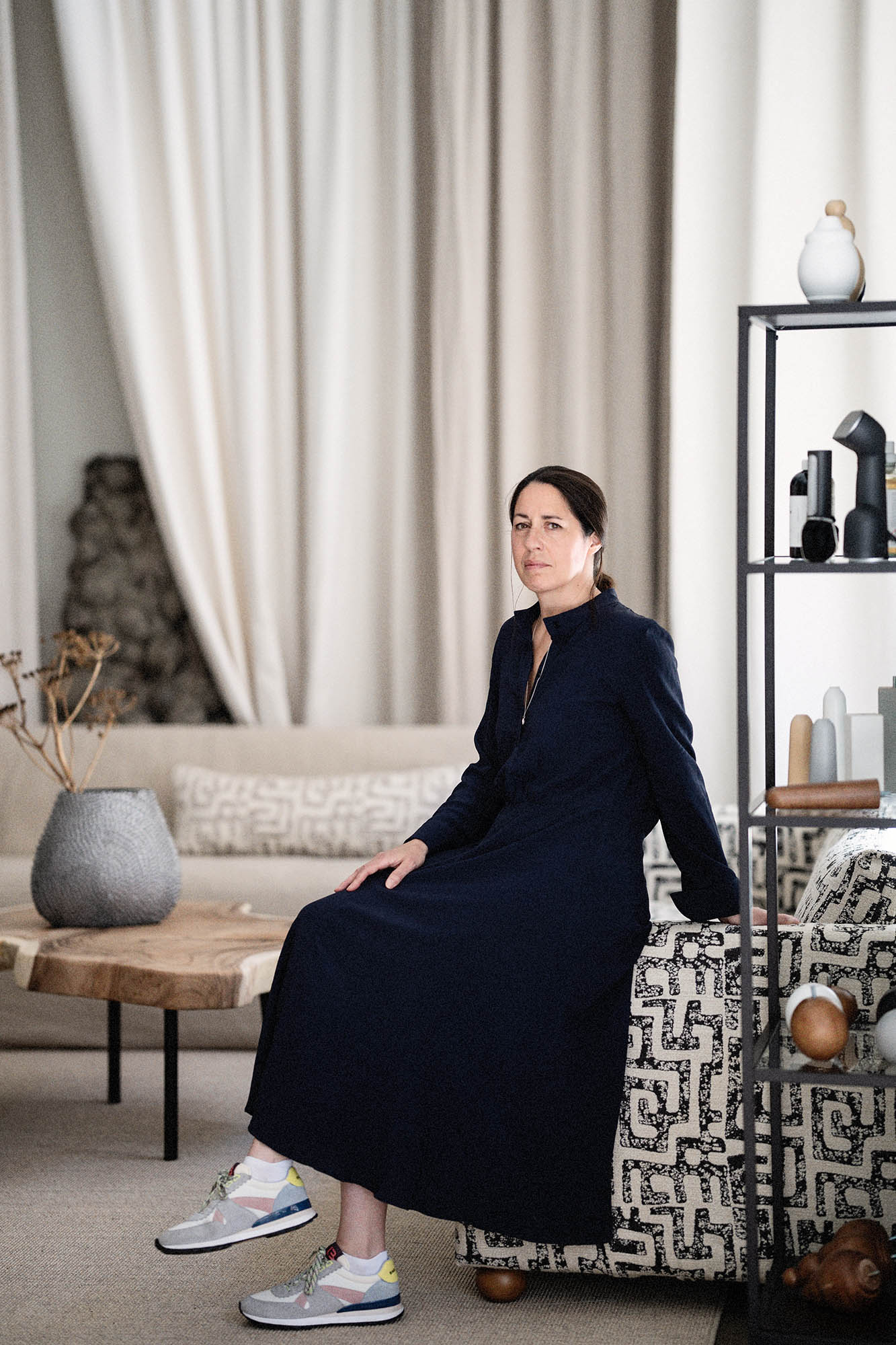 a woman sitting on a couch