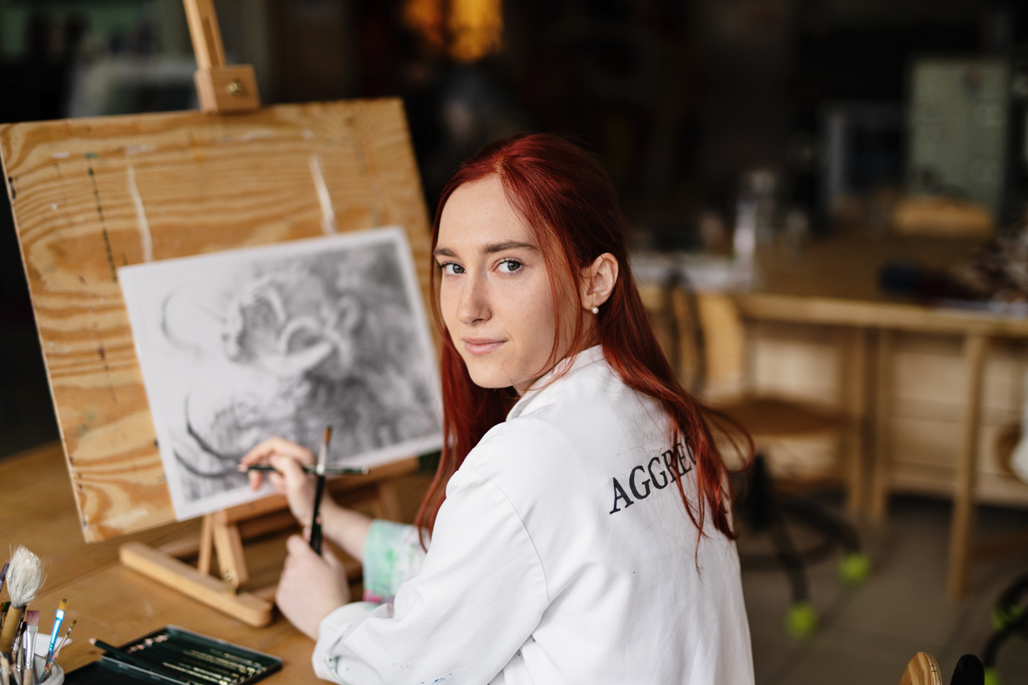 a woman painting a picture