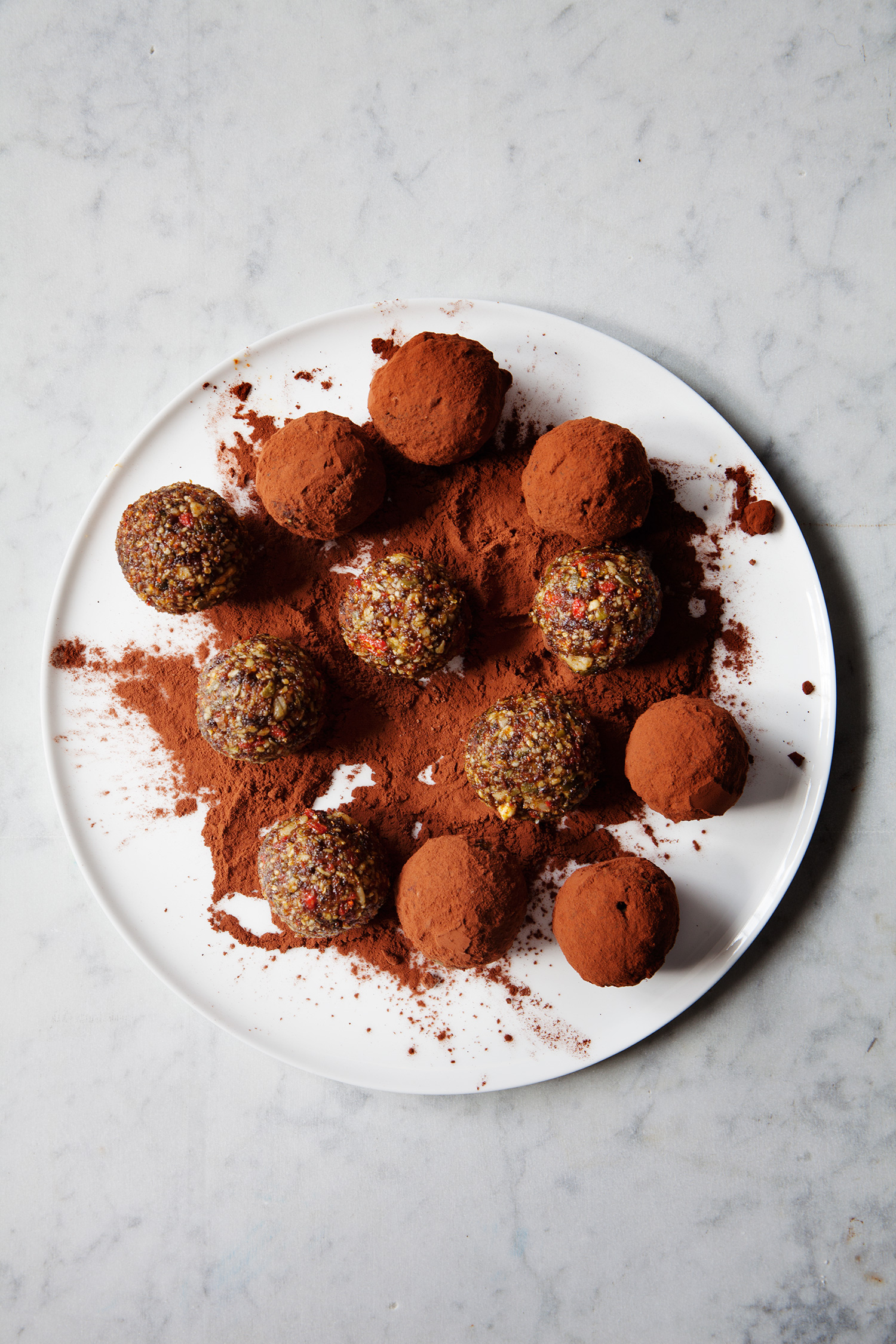 a plate of chocolate truffles