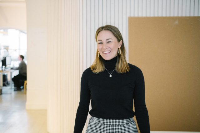 a woman smiling at camera