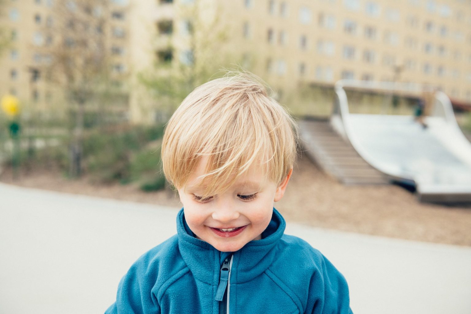 a child smiling at the camera