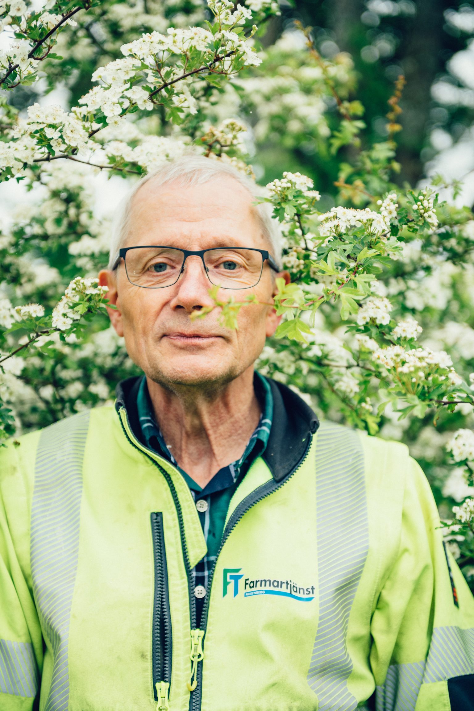 a man in a yellow jacket