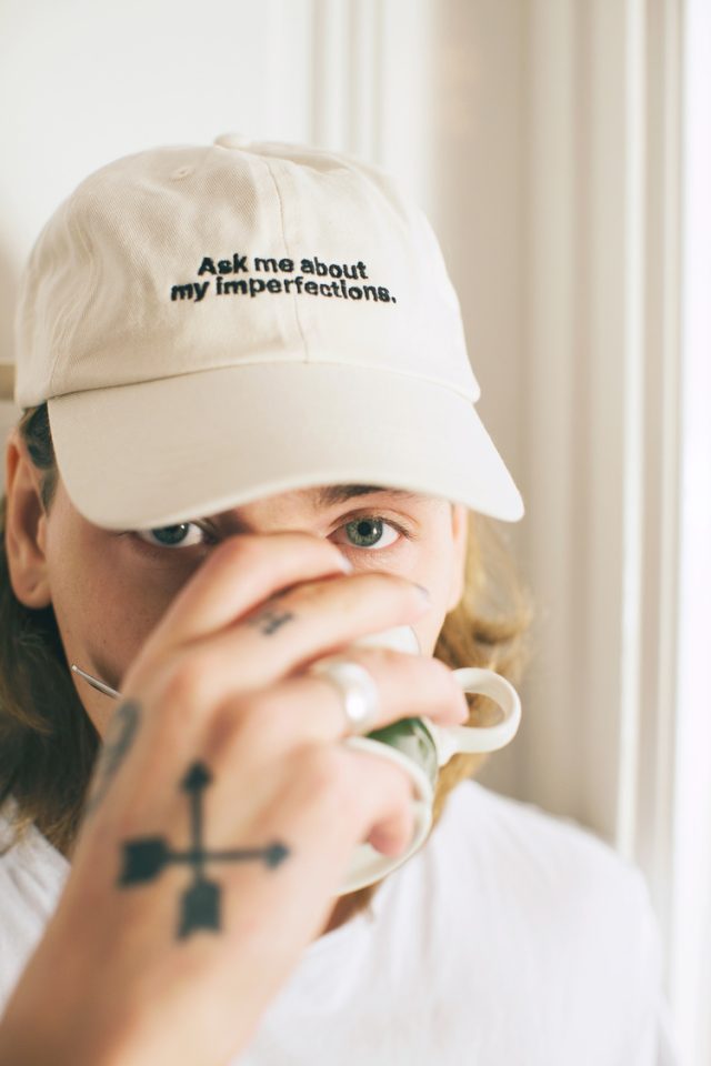 a person drinking from a cup