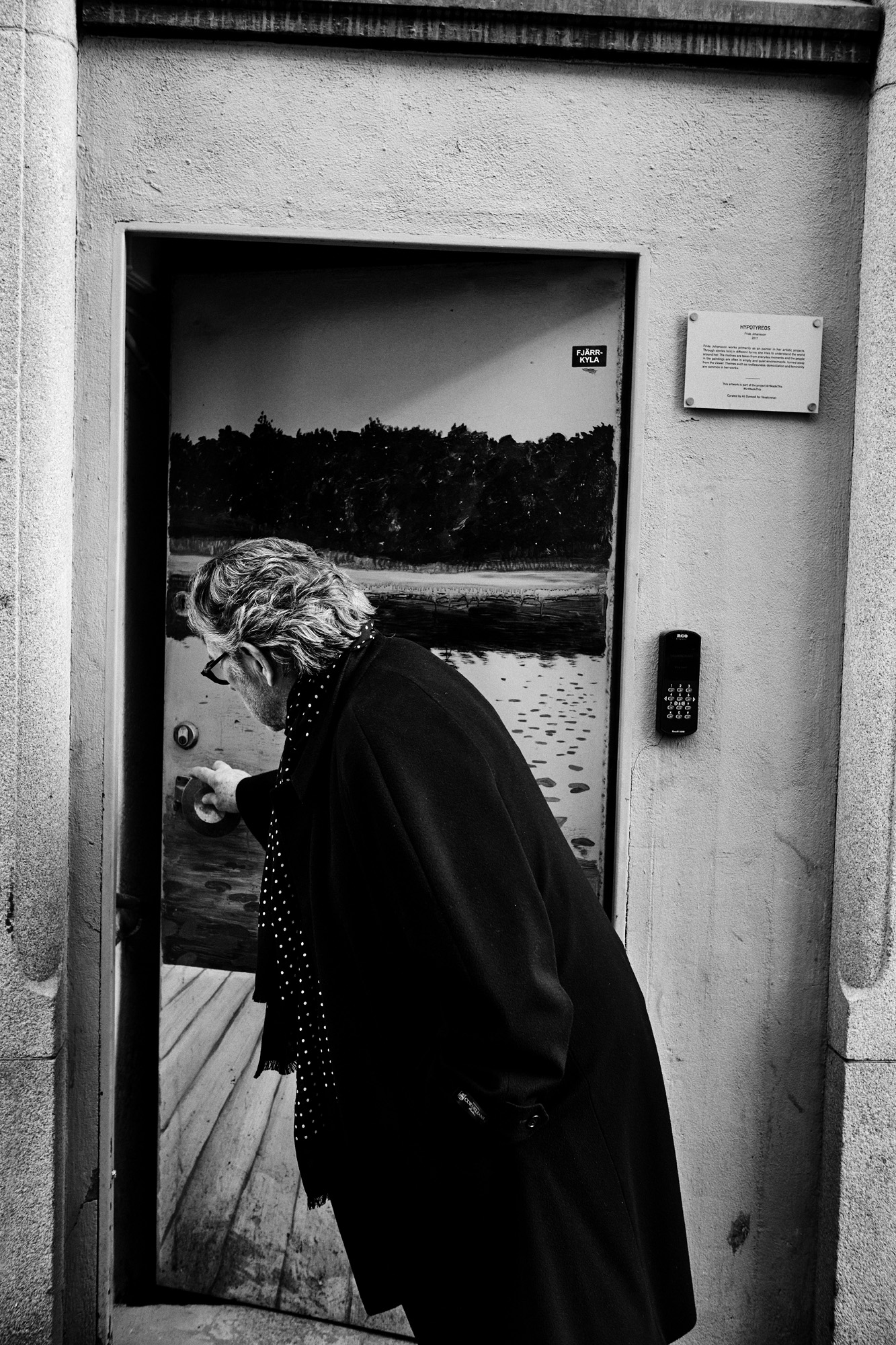 a woman opening a door