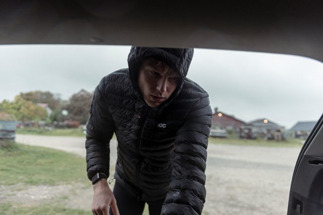 a man in a black coat