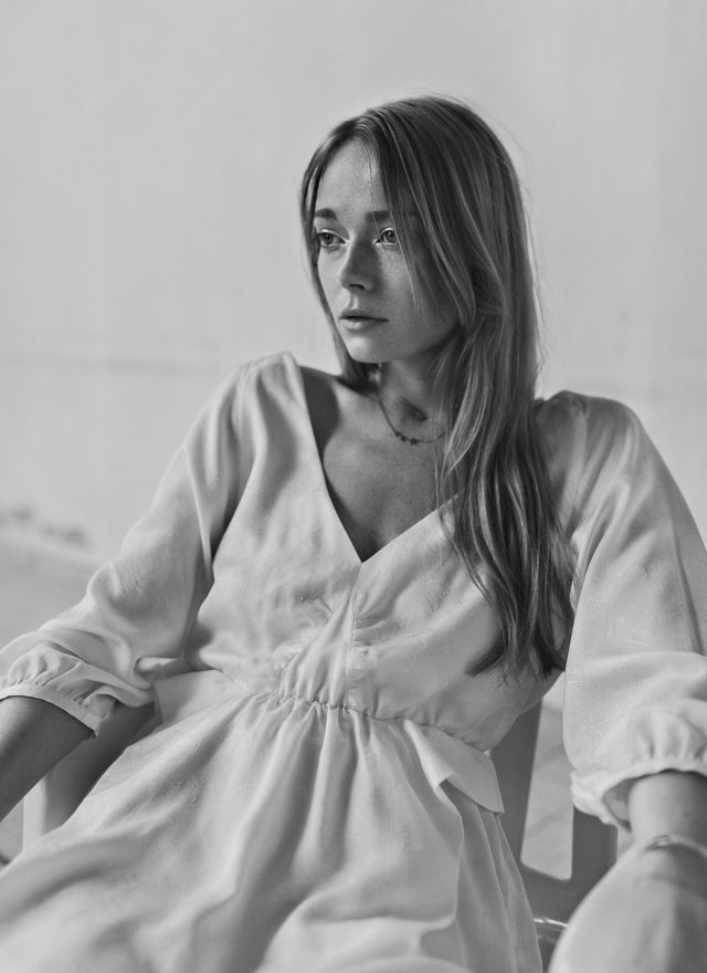 a woman sitting in a chair