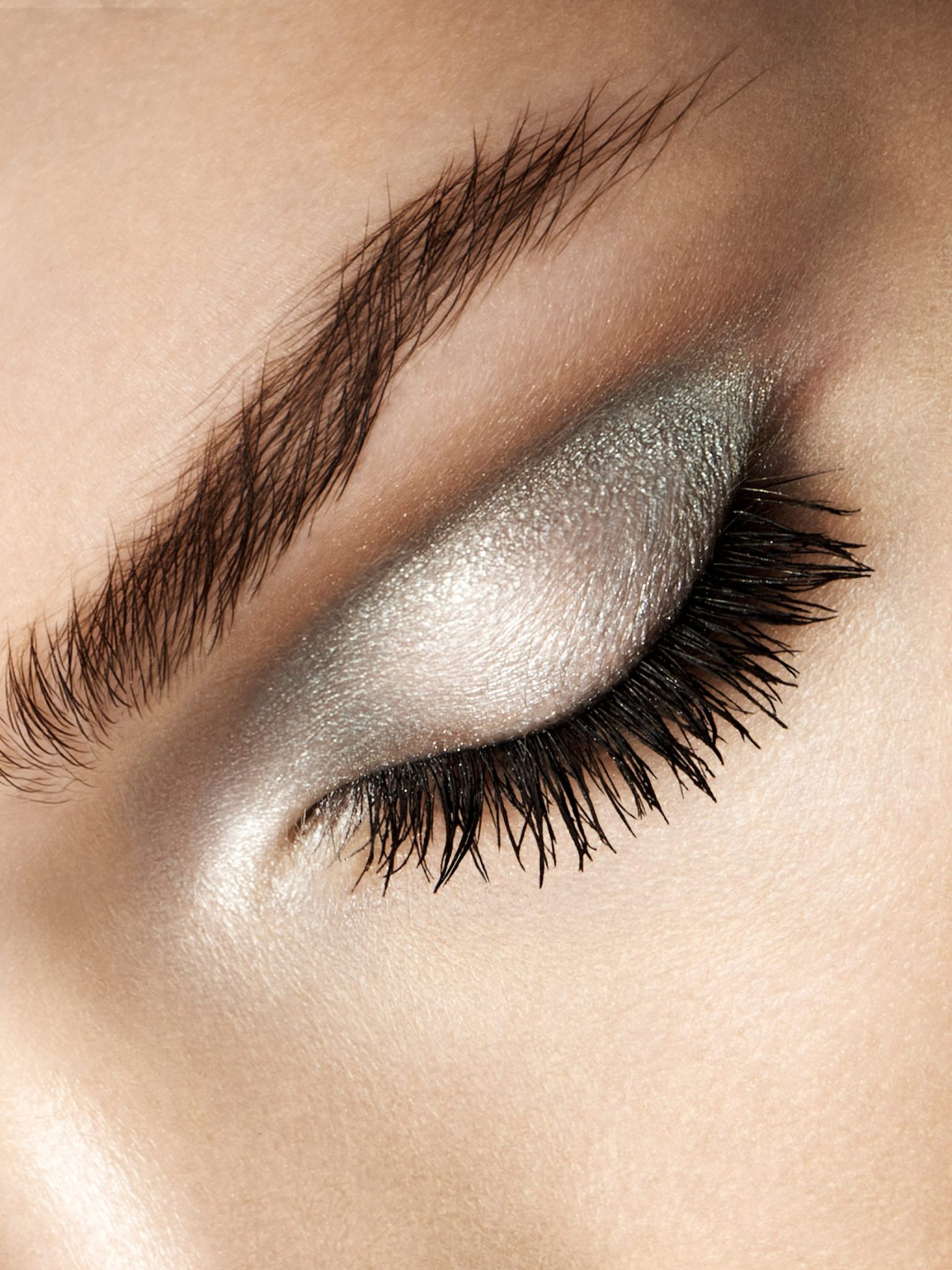 a close up of a woman's eye