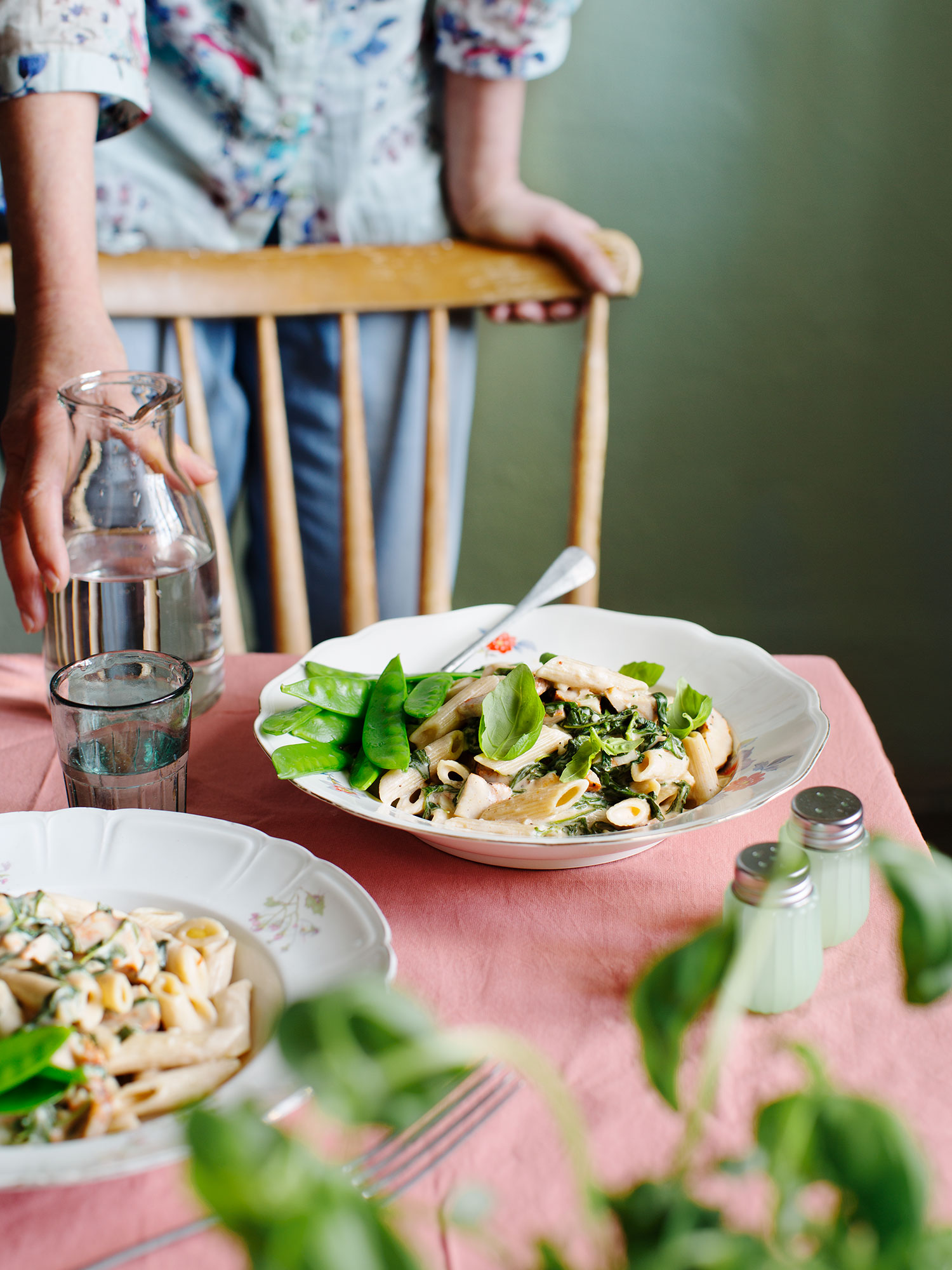 a plate of pasta and vegetables on a table