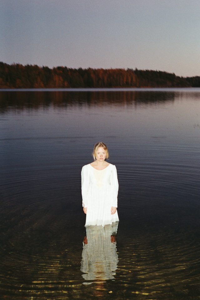 a woman standing in water