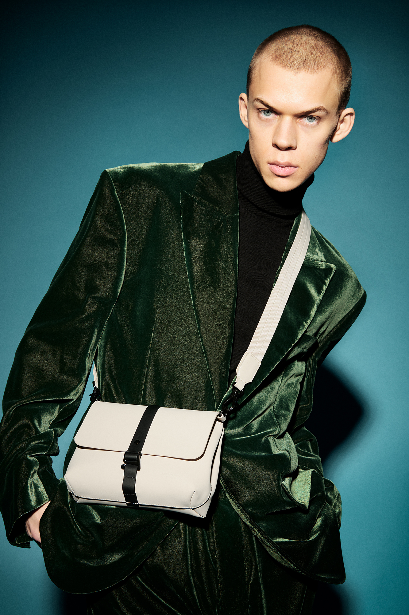 a man in a green jacket