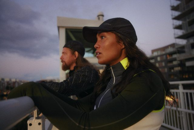 a woman and man looking away from the camera