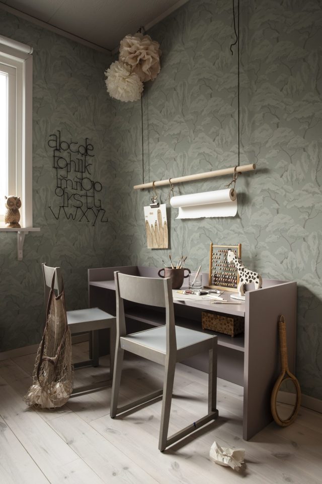 a desk and chair in a room