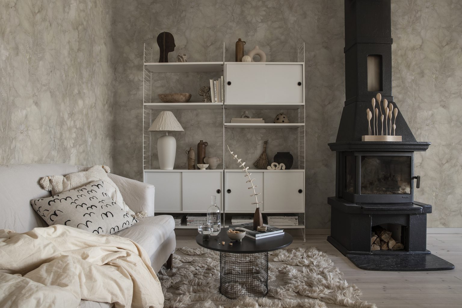 a room with a fireplace and a couch