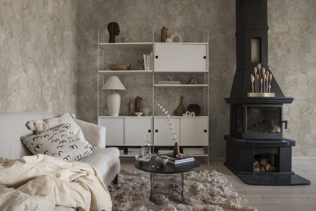a room with a fireplace and a couch