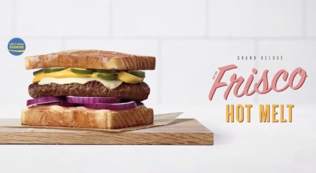 a sandwich on a cutting board