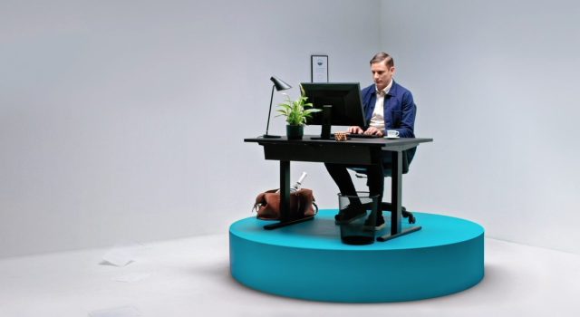 a man sitting at a desk