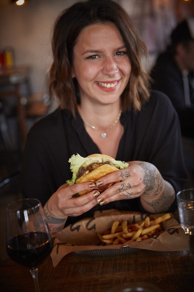 a woman smiling at camera