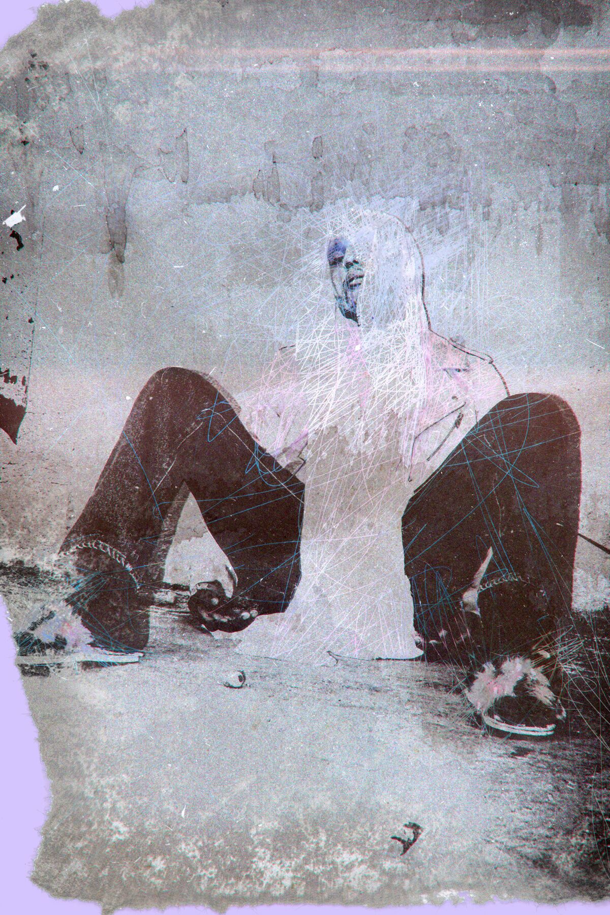 a man sitting on the ground