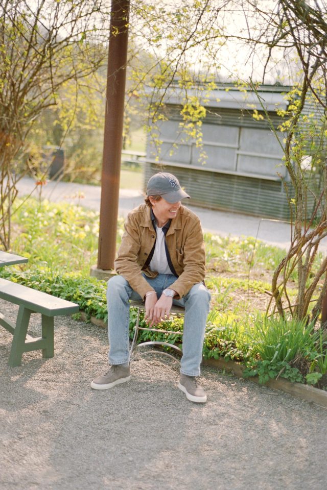 a man sitting on a bench