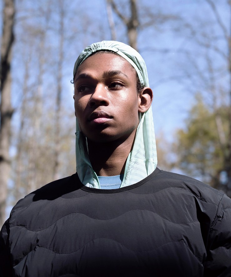 a man with a scarf on his head