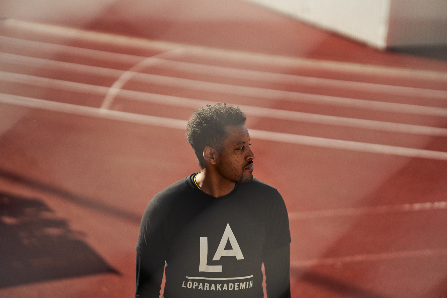 a man standing on a track